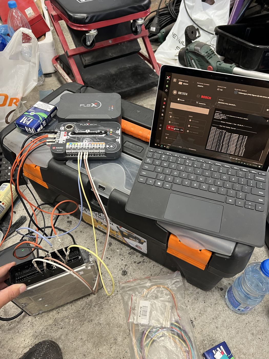 Bosch EDC17C74 ECU wired to a Flex box with backup progress on screen